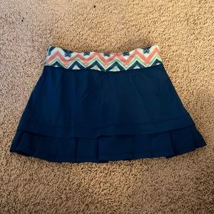 ivivva skirt, built in shorts, pocket in back and front, drawstring in waistband